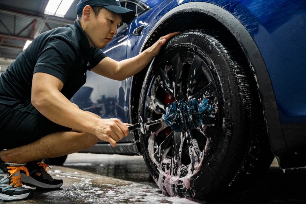 Cleaning wheels with brush and wheel cleaner
