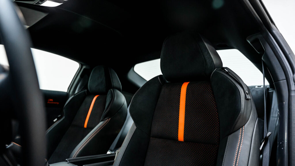Orange and black alcantara seats