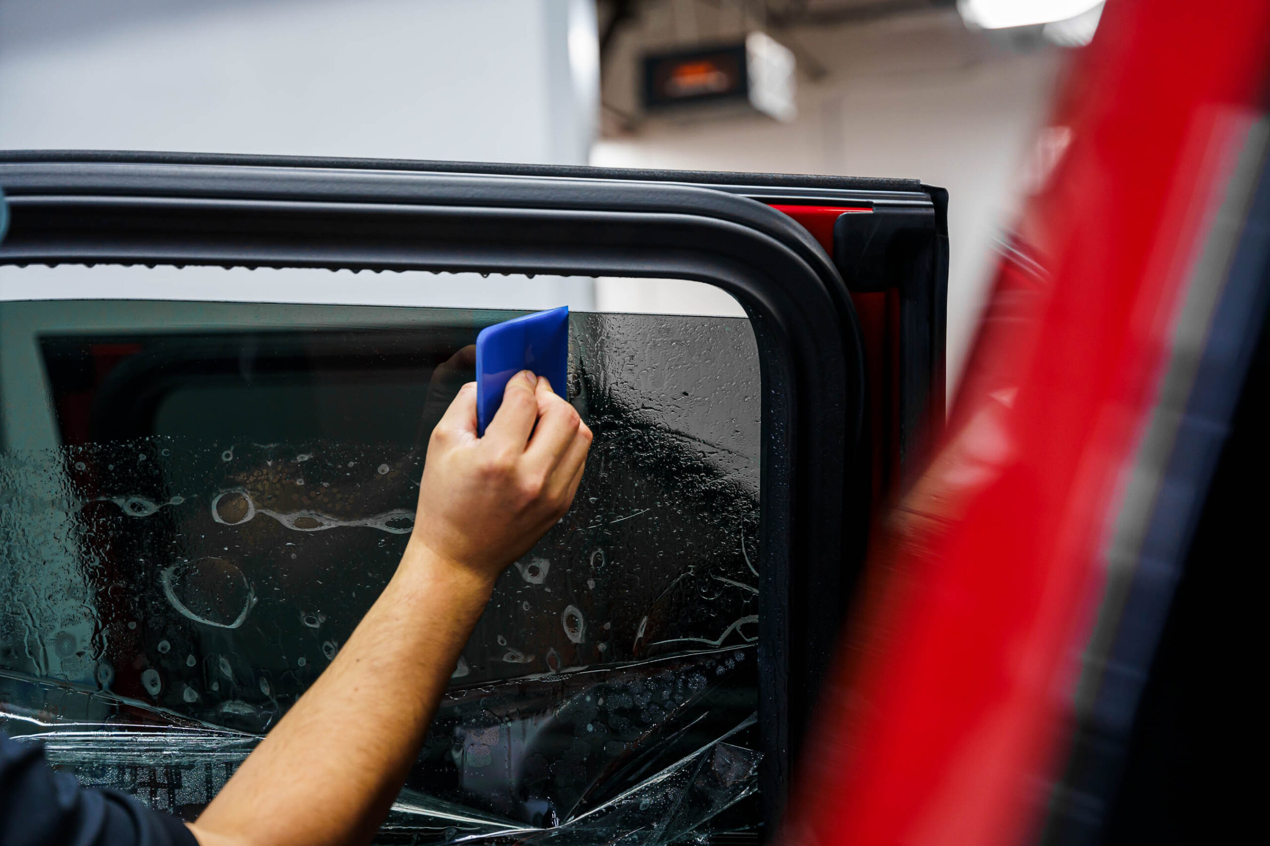 Applying ceramic tint to rear driver window