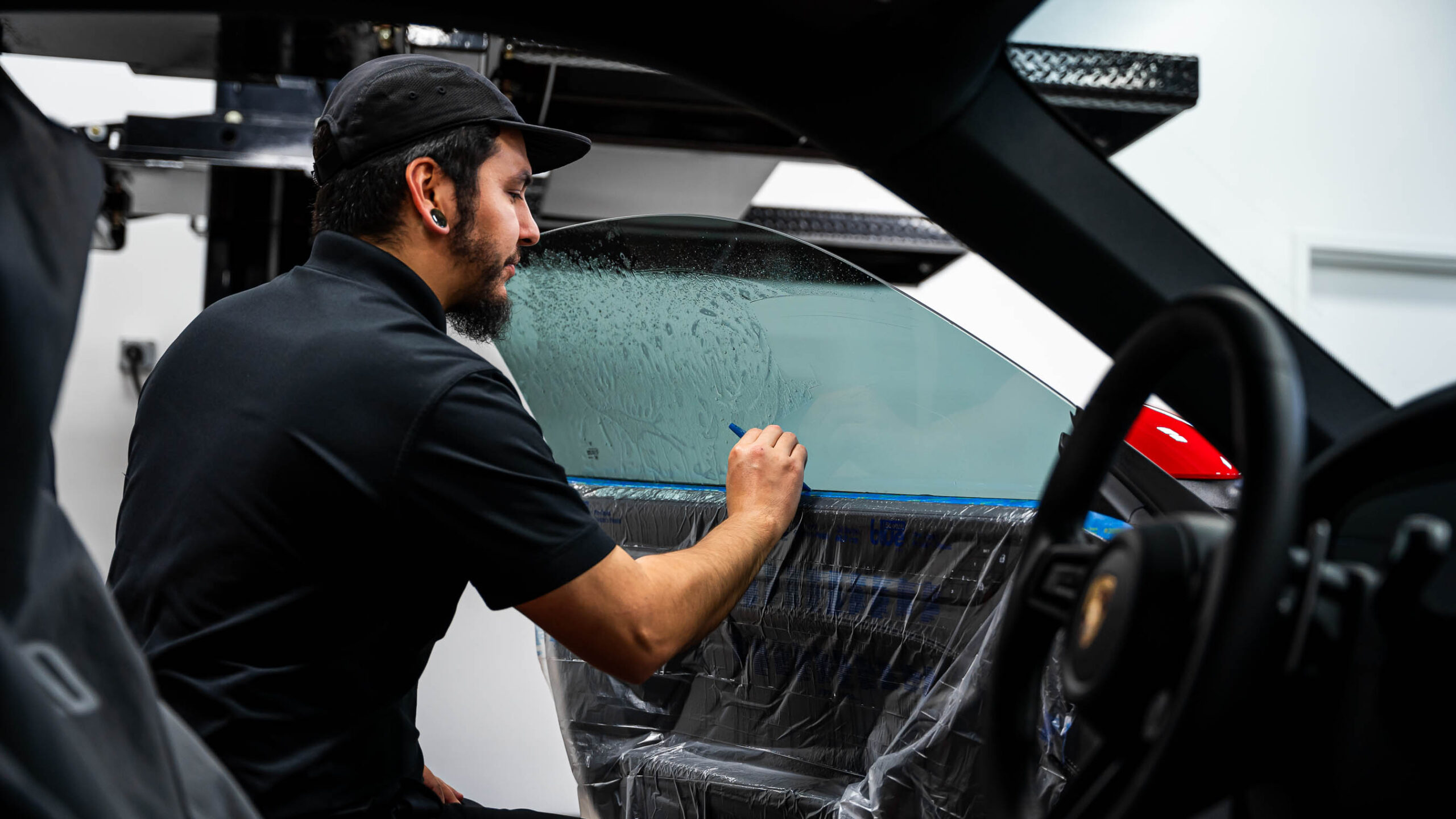 Installing tint with a squeegee
