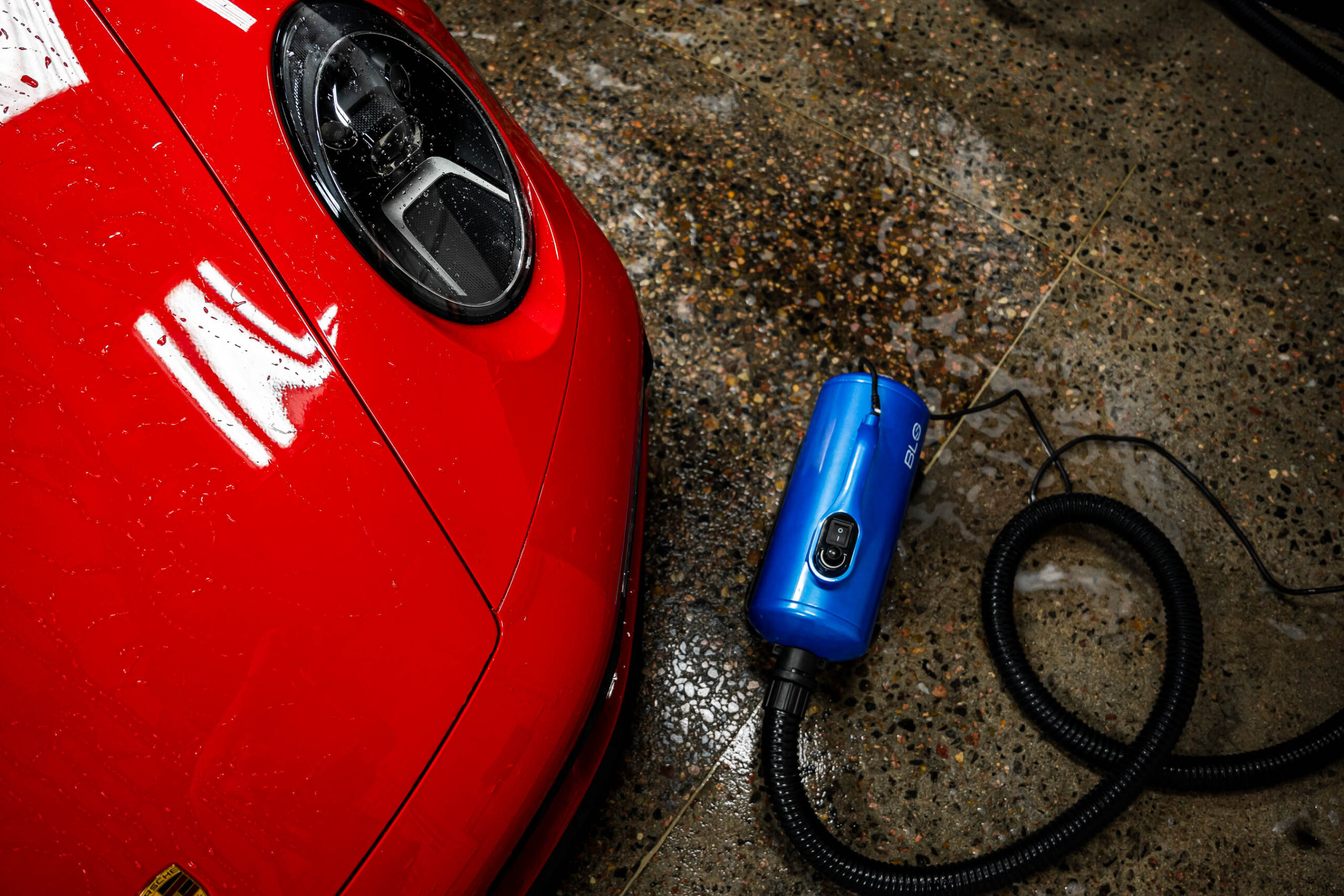 Using a BLO Car Dryer to touchlessly dry vehicle